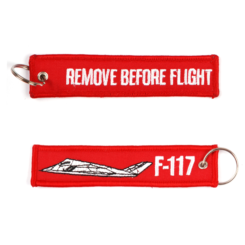 Přívěsek na klíče Fostex Remove before flight F-117 - červený