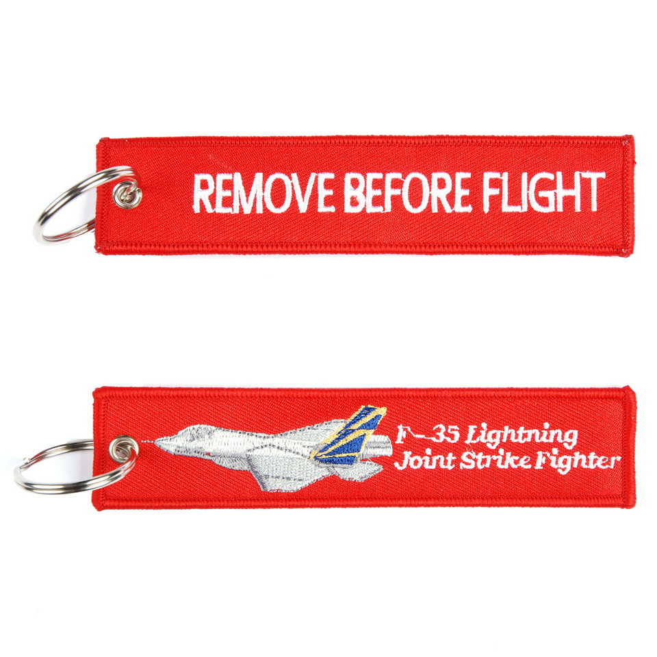 Přívěsek na klíče Fostex Remove before flight F-35 Lightning 1 - červený