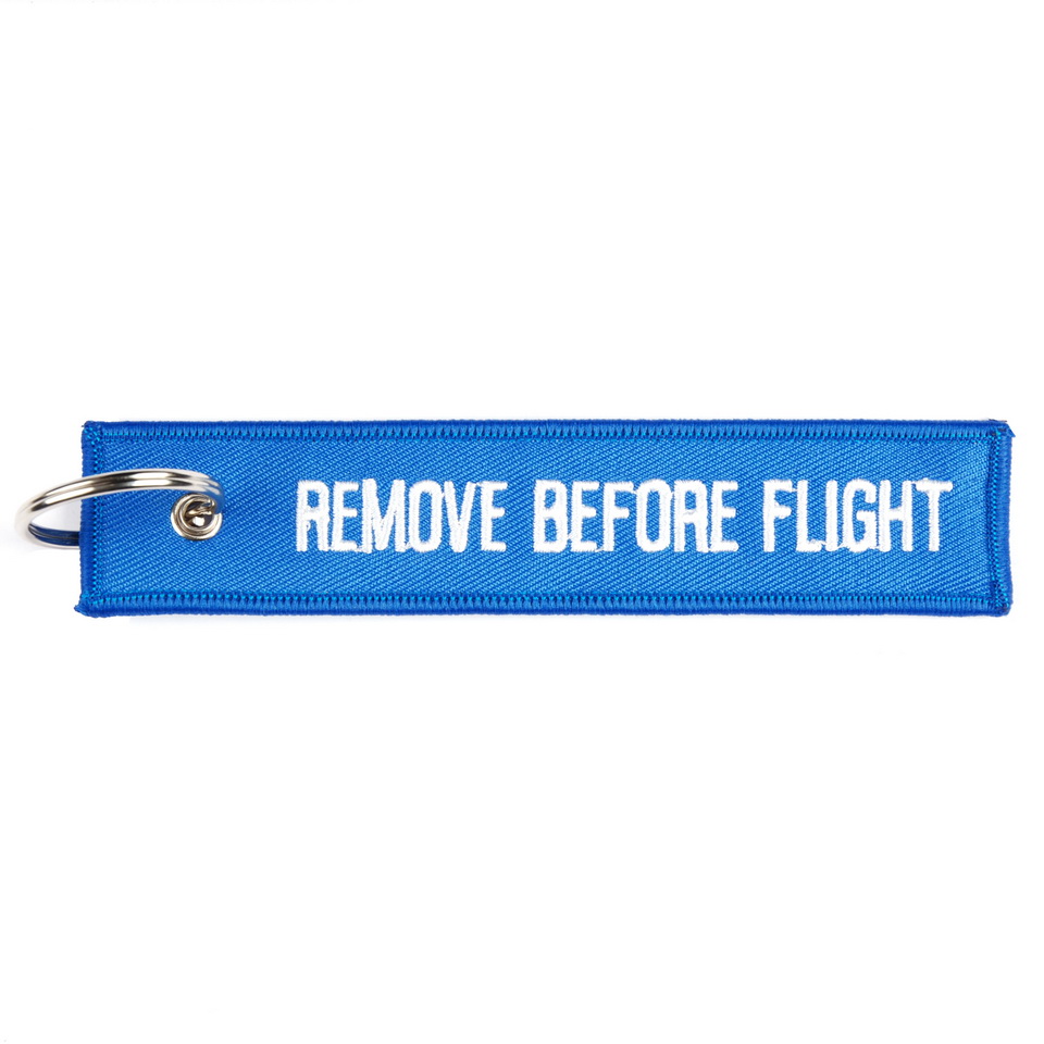 Přívěsek na klíče Fostex Remove before flight - modrý