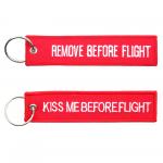 Přívěsek na klíče Fostex Remove before flight + Kiss me