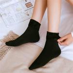 Hrejivé ponožky s kožúškom - čierne