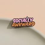 Odznak (pins) nápis Socially awkward 1,5 x 3,6 - ružový-oranžový