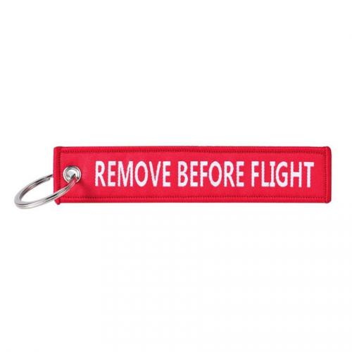 Přívěsek na klíče Fostex Remove before flight - červený-bílý