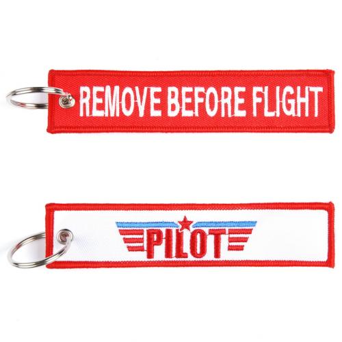 Přívěsek na klíče Fostex Remove before flight Pilot - červený-bílý