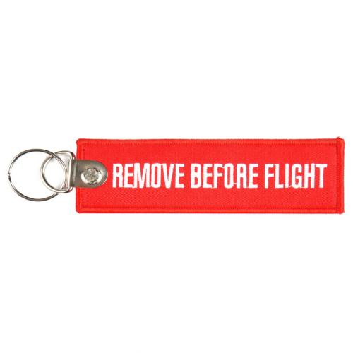 Přívěsek na klíče Fostex Remove before flight 2 - červený