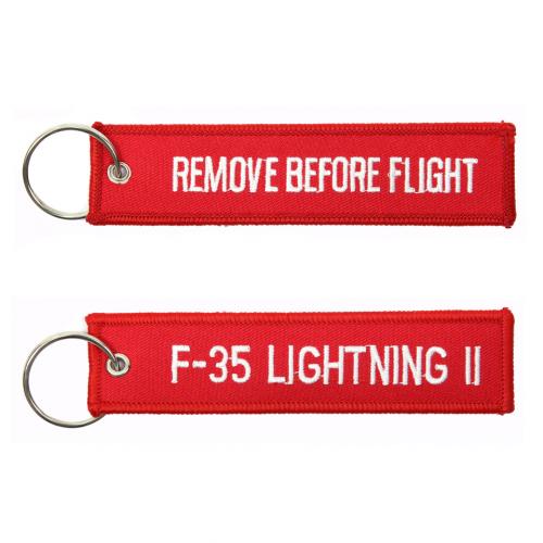 Prívesok na kľúče Fostex Remove before flight F-35 Lightning II - červený