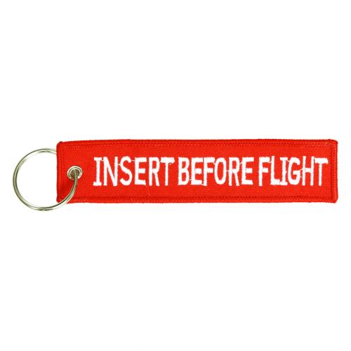Přívěsek na klíče Fostex Insert Before Flight - červený-bílý